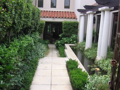 Formal Front Entrance With Pondrnley