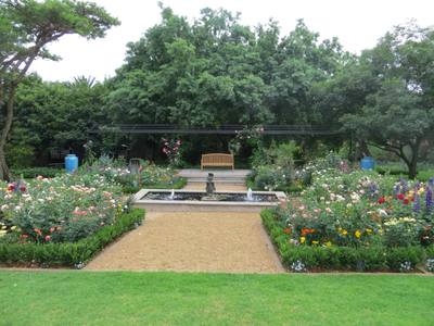 Rose Garden With Pond And Pergola