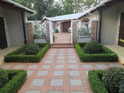 Topiary Balls Inside A Buxus Hedge